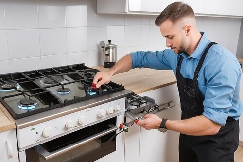 Expert servicing of gas cooking range in a modern kitchen